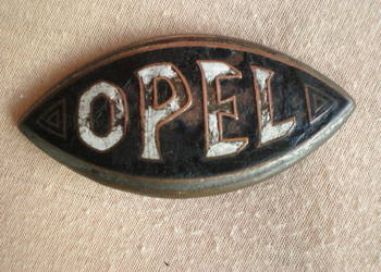 Stare, kilkudziesięcioletnie metalowe  logo OPEL