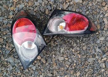 Lampa tył prawa lewa tylna lamp komplet karoseryjna Mazda 6 sedan