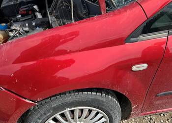 Błotnik lewy Fiat Grande Punto 163/B