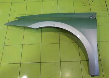 RENAULT LAGUNA III 08r HB 5D blotnik lewy przod