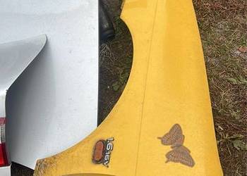 Błotnik  lewy Renault Megana I  lift żółty bez malowania