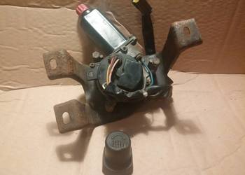 silniczek unoszenia lampy lewej Ford Proe II 1995r.