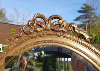 owalne lustro z kokardką Made in Belgium