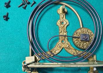 System mocowania mechanizmu zegara z patentem(komplet śrub w zestawie)