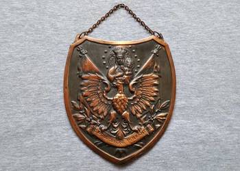 Ryngraf mosiężny z Matką Boską, orzeł w koronie.