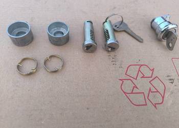 Polonez bebenki wkładki bębenki sprezynki zabieraki L P klamka kaseta