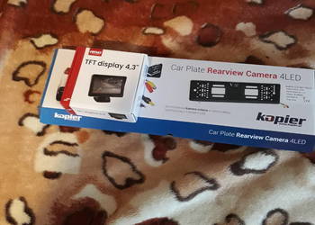 Kamera cofania w tablicy rejestracyjnej z monitorem