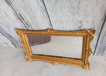 eleganckie, złote lustro ścienne w stylowej, dekoracyjnej ramie /  304
