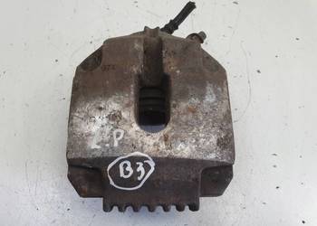 BMW E39 PRZEDNI ZACISK HAMULCOWY lewy przód kierowcy