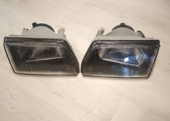 Lampy przednie Fiat Cinquecento CARELLO prawa lewa oryginał