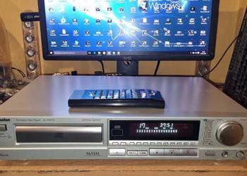 Odtwarzacz CD Technics SL-P477A srebrny z pilotem JOG Top Silver Edition.