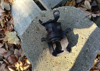 Zacisk hamulcowy lewy tył ford focus