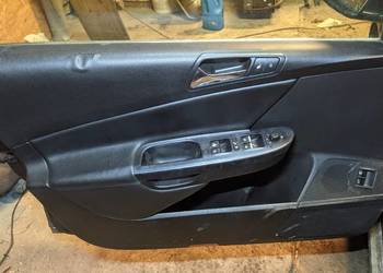 Boczki czarne skórzane passat b6 kombi