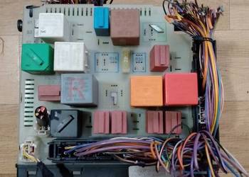 FORD ESCORT SKRZYNKA BEZPIECZNIKÓW 97AG14A073EB