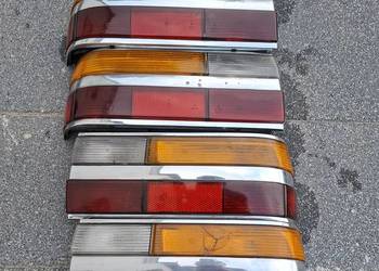 Lampy tylne, grill, wykładzina bagażnika, licznik Bmw E28 520 524 528 535