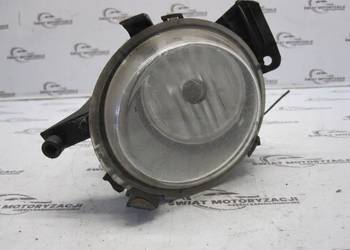 OPEL CORSA D halogen lewy 13262573
