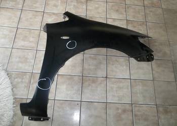 TOYOTA  AURIS E 15 06/10 blotnik prawy