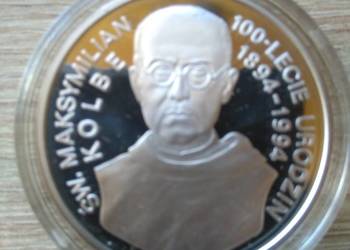 39. Moneta kolekcjonerska o nominale 300000 zł.