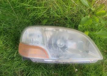 Reflektor lampa przednia Prawy Suzuki Ignis I 00-03