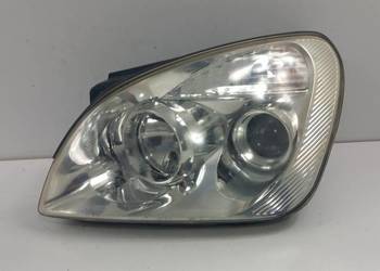 KIA CARENS III LAMPA PRZÓD LEWA SOCZEWKA