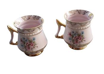 Stara para filiżanek UPAK Carlsbad Pirkenhammer ręcznie malowana porcelana