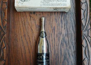 Francuski oryginalny metalowy otwieracz do szampana - sygnowany