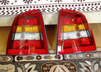 Astra 2 G II Lampy orginalne dymione Coupe Bertone Sedan