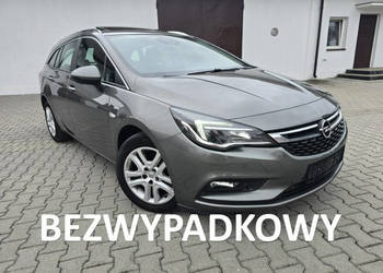 Opel Astra 1,4Turbo Benz. Navi.Kam.Cof.Asystent Pasa Ruchu.Ledy.Szyberdach… Opel Astra 1,4Turbo Benz. Navi.Kam.Cof.Asystent Pasa Ruchu.Ledy.Szyberdach…