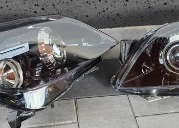 Reflektory Opel Astra H bi xenon skrętny po regeneracji Hella black