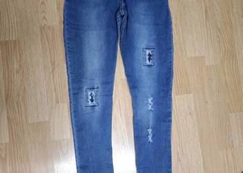 Spodnie damskie jeansy rozmiar S rurki z dziurami