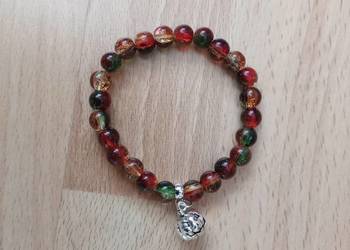 Bransoletka ze szklanych koralików z zawieszką "Dynia Halloween"- handmade