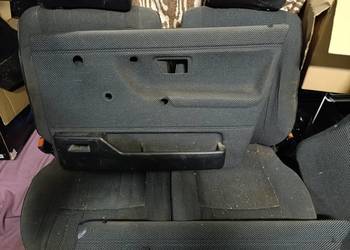 Golf 2 siedzenia  tapicerka boczki wygłuszenie.