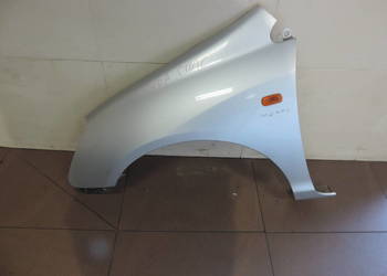 HONDA CIVIC VII BŁOTNIK LEWY PRZÓD NH623M