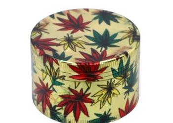 Złoty Crusher Młynek do Tytoniu Grinder Metalowy z Zielonymi Listkami