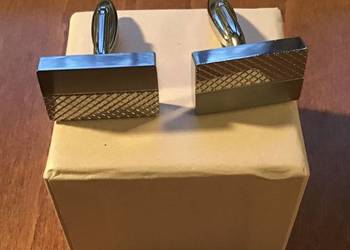 Nowe, stalowe spinki do mankietów