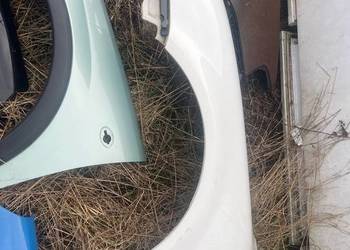 Blotnik lewy vw passat b5 biały