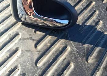 Klamka wewnętrzna drzwi lewy przód Mazda Premacy I lift