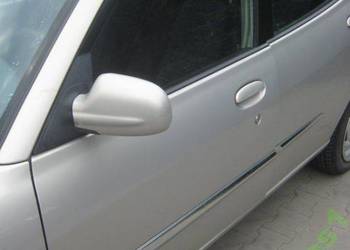 DAIHATSU SIRION 02-05R DRZWI PRZÓD LEWE KOD S26