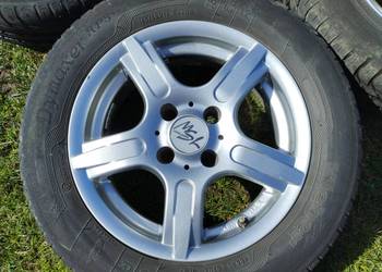 Felgi aluminiowe 4x100 14" ET35 z oponami letnimi 185/60R14