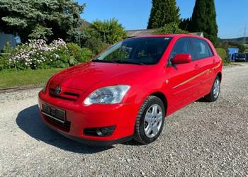 COROLLA E12 drzwi lewy przód czerwoną bez malowaniaNIEMIEC