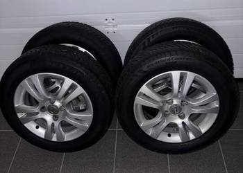 Opony wielosezonowe koła felgi aluminiowe 185 65 r15