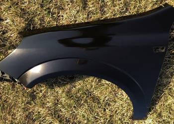 błotnik lewy Opel Astra h czarny z20r