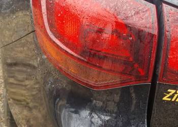 Lampa tylna lewa astra j kombi.