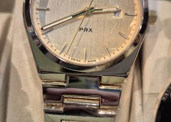 Zegarek męski Tissot złoty.