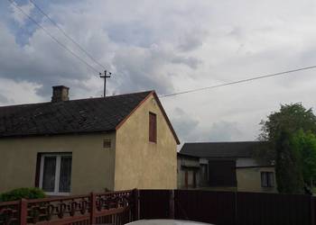 1,7 ha wraz z zabudowaniami