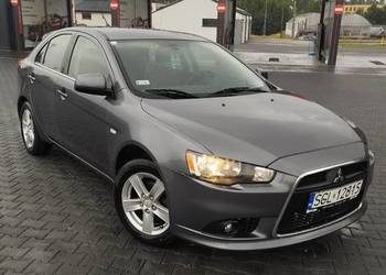 Mitsubishi Lancer 1.5 benzyna 2009 rok 180 tys km .