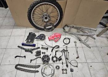 Kawasaki KLR 250 części koło napęd zabierak linka oś bęben stopka klr250