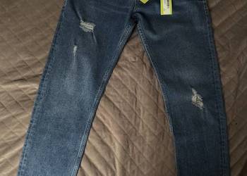 Jeansy Versace