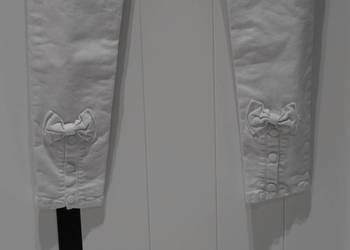 Elegant's Deluxe świetne spodnie kokardki nowe 34 XS