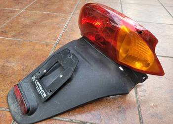 DERBI ATLANTIS - lampa tyl tylnia blotnik - komplet